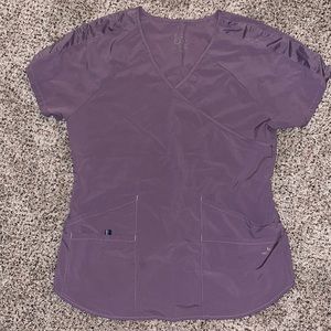 Barco one wellness scrub top